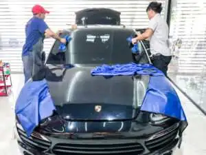 เปลี่ยนกระจกรถยนต์ Porsche