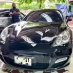 เปลี่ยนกระจกรถยนต์ Porsche